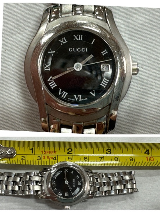 Gucci 5500L women’s stainless steel watch with date